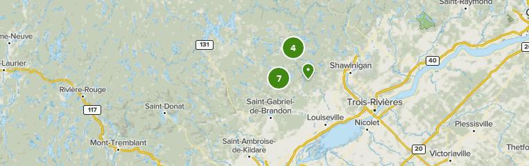 Carte indiquant les emplacements de 7 parcs nationaux dans la région de la Mauricie, au Québec.