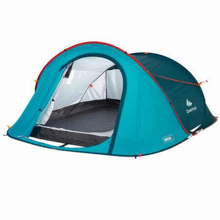 Une tente de camping bleue et verte avec deux ouvertures.